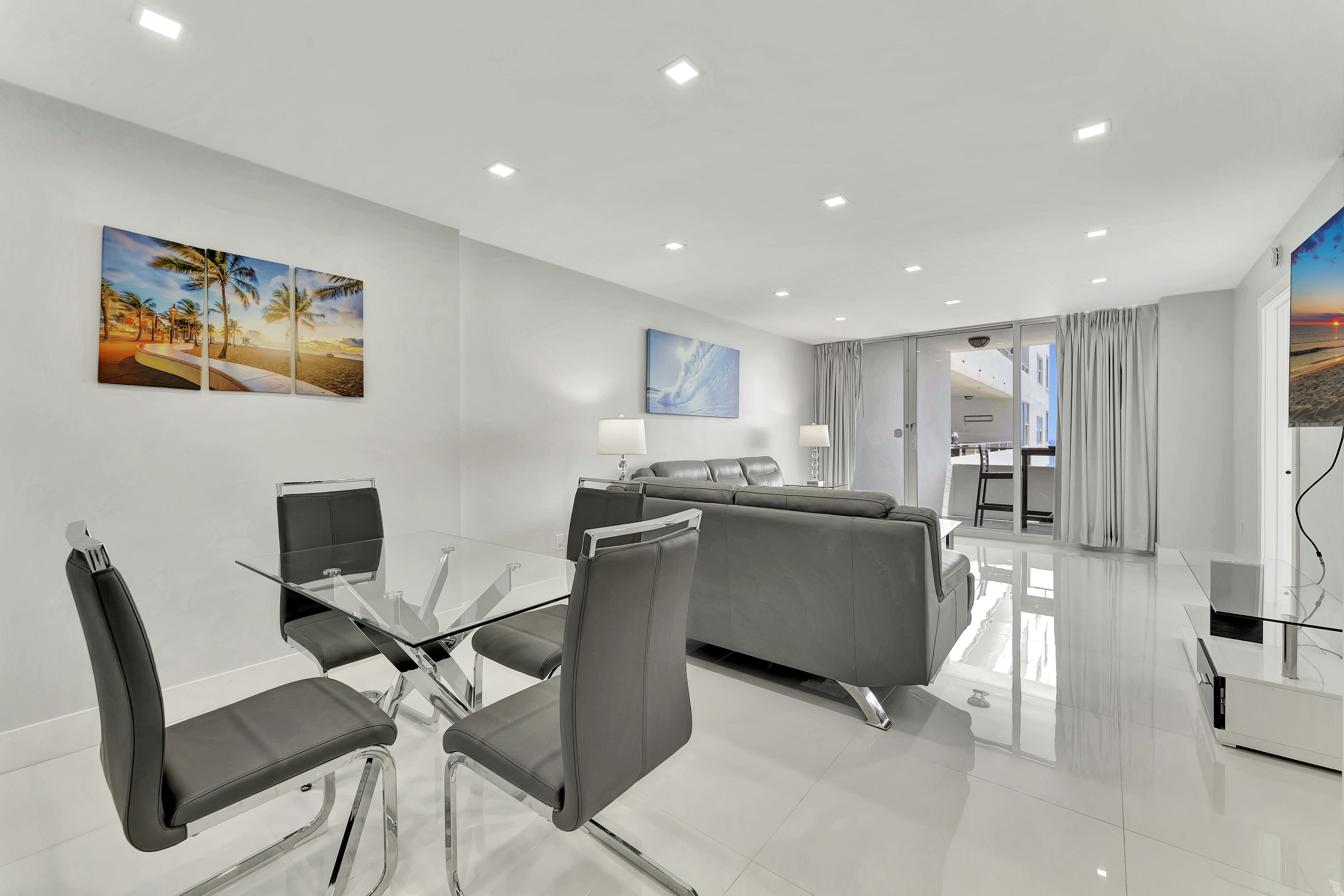 1 Bedroom Suite open concept dining and living room with modern furnishings