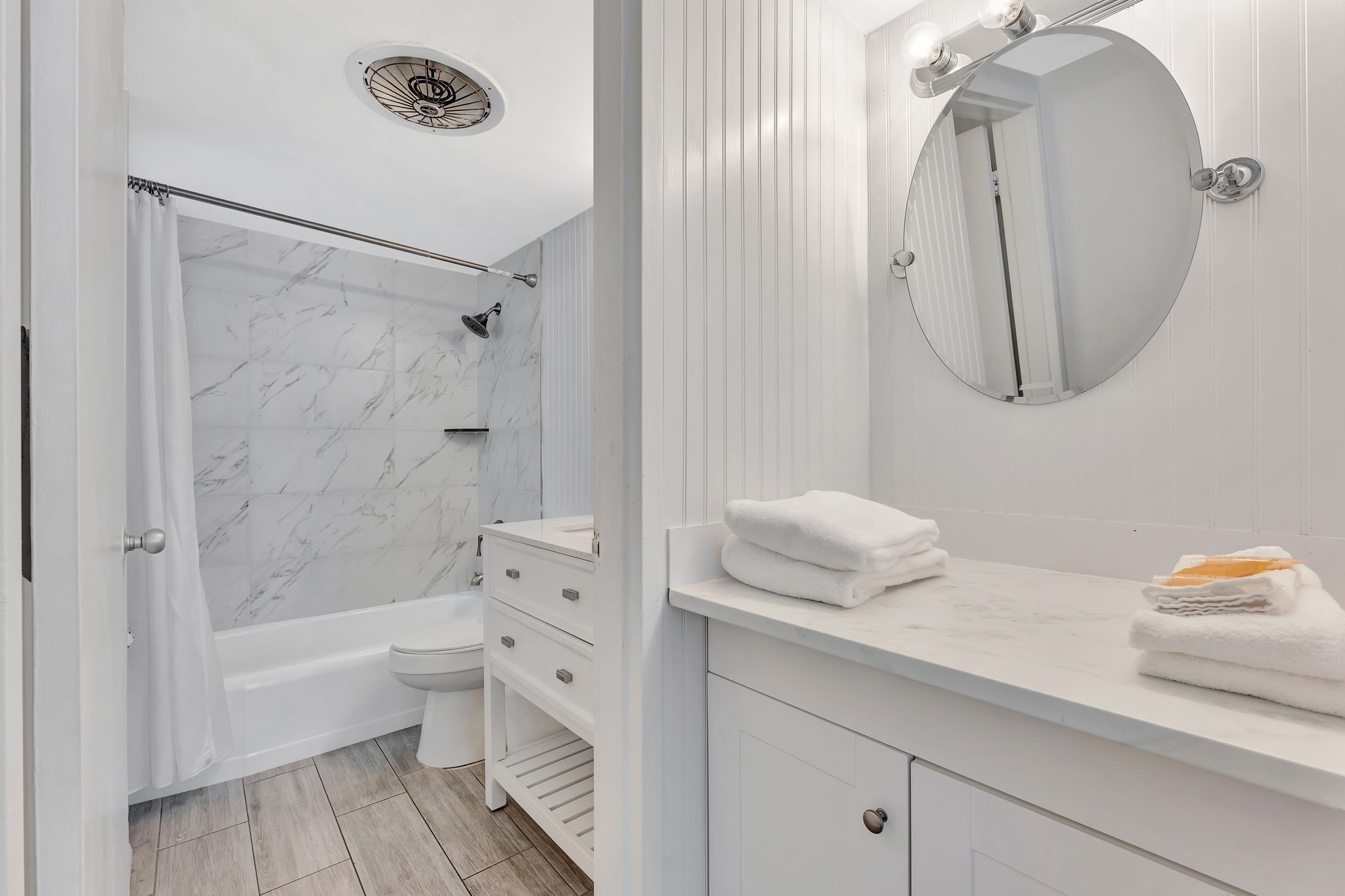 2 Bedroom Suite luxury bathroom with elegant marble design and modern fixtures