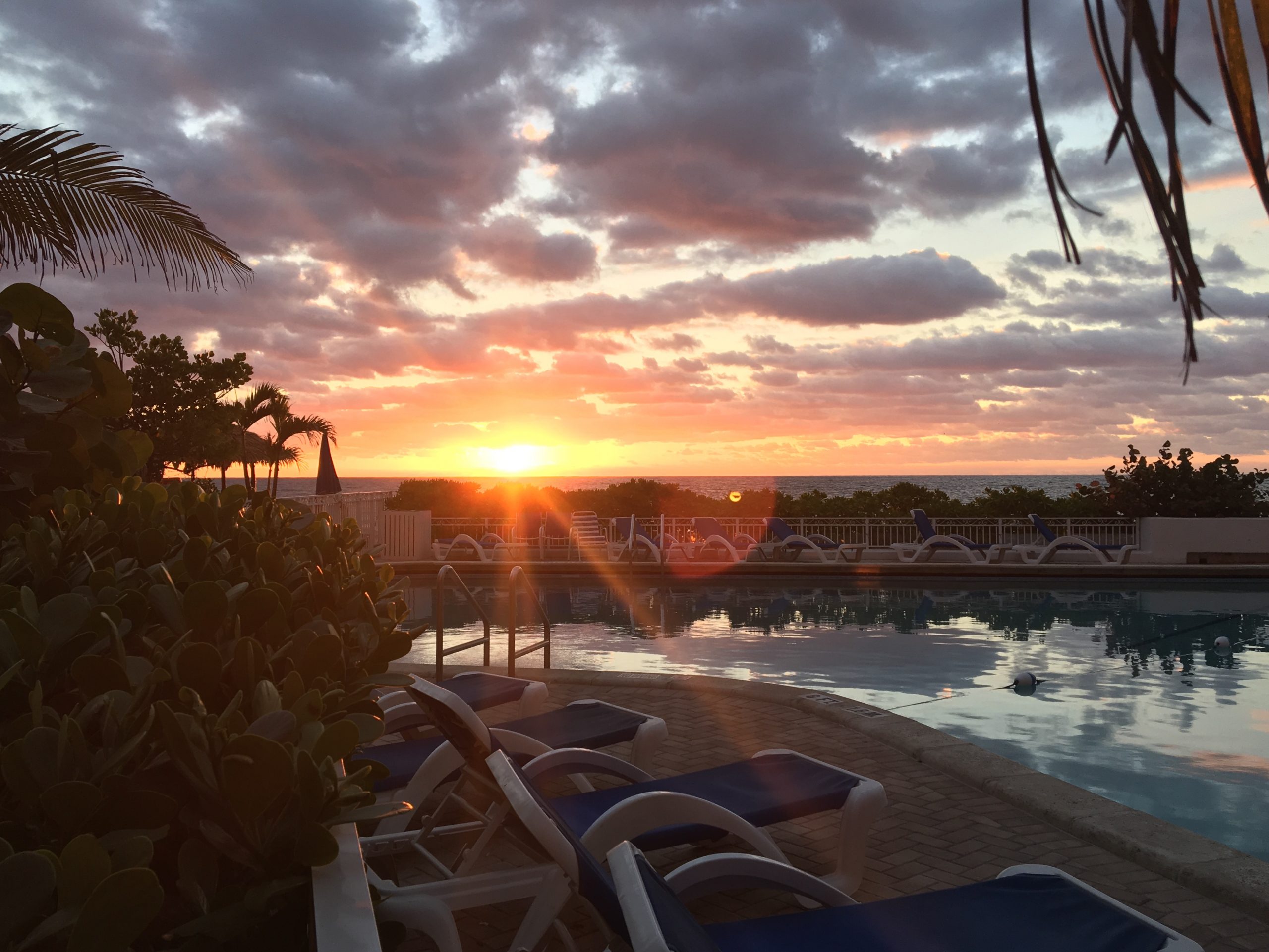 Sunrise over the Atlantic and golden sunset glow at Ocean Manor Beach Resort