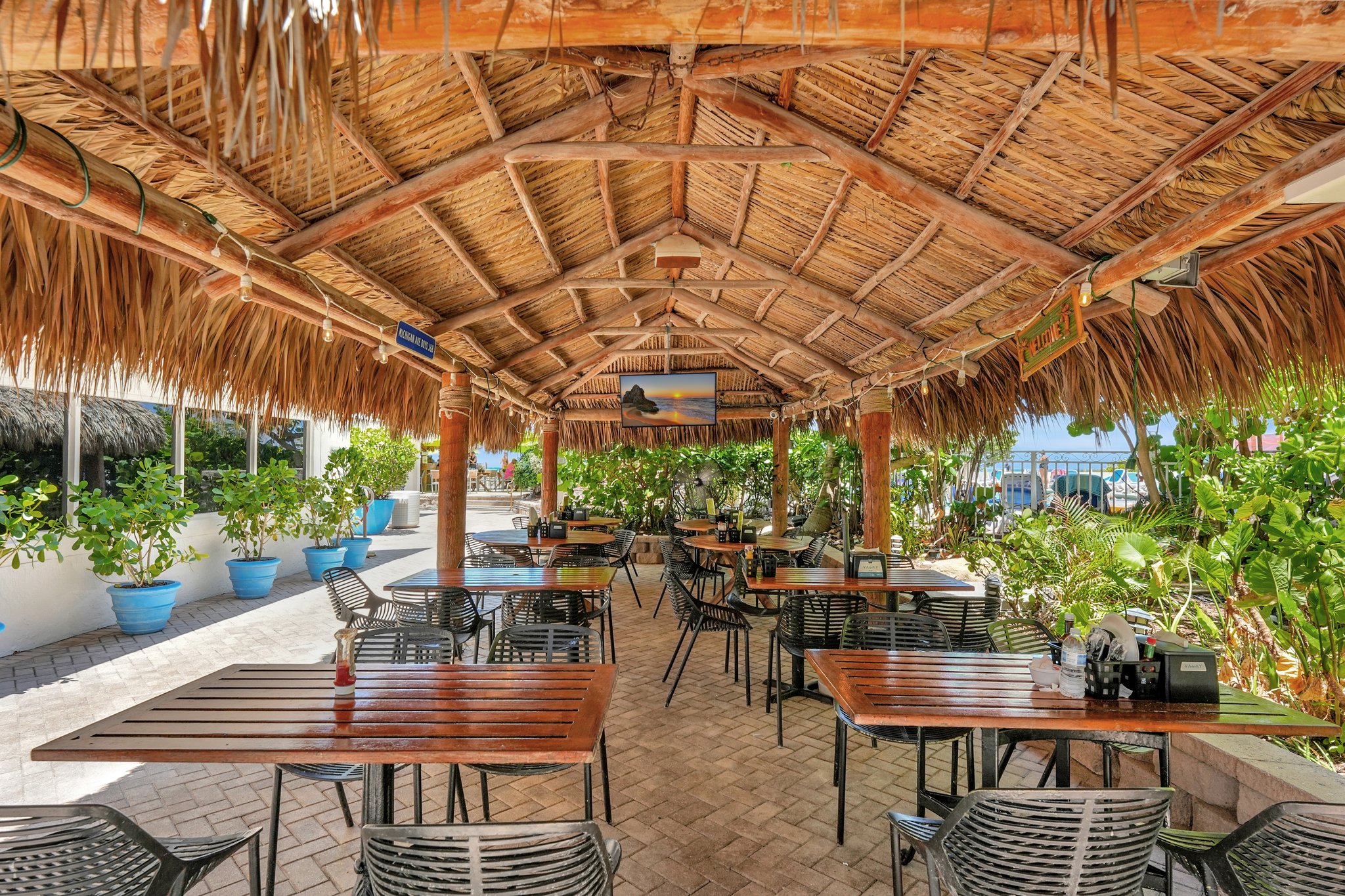 Covered patio seating at Bamboo Beach Tiki Bar