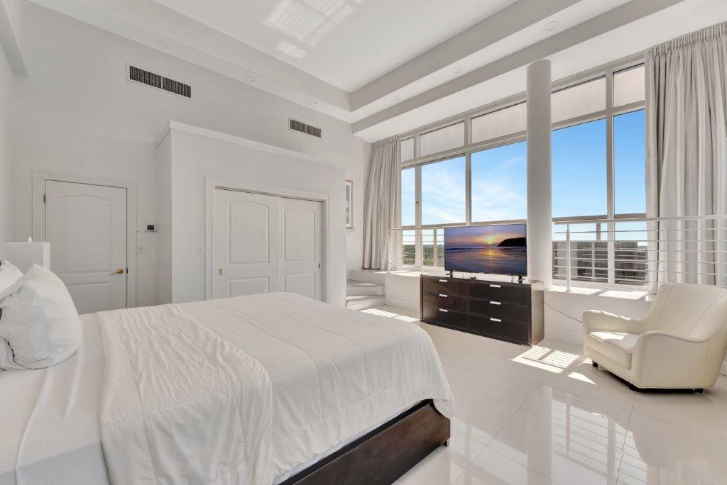 Penthouse 1104 city‑view bedroom with panoramic Fort Lauderdale skyline