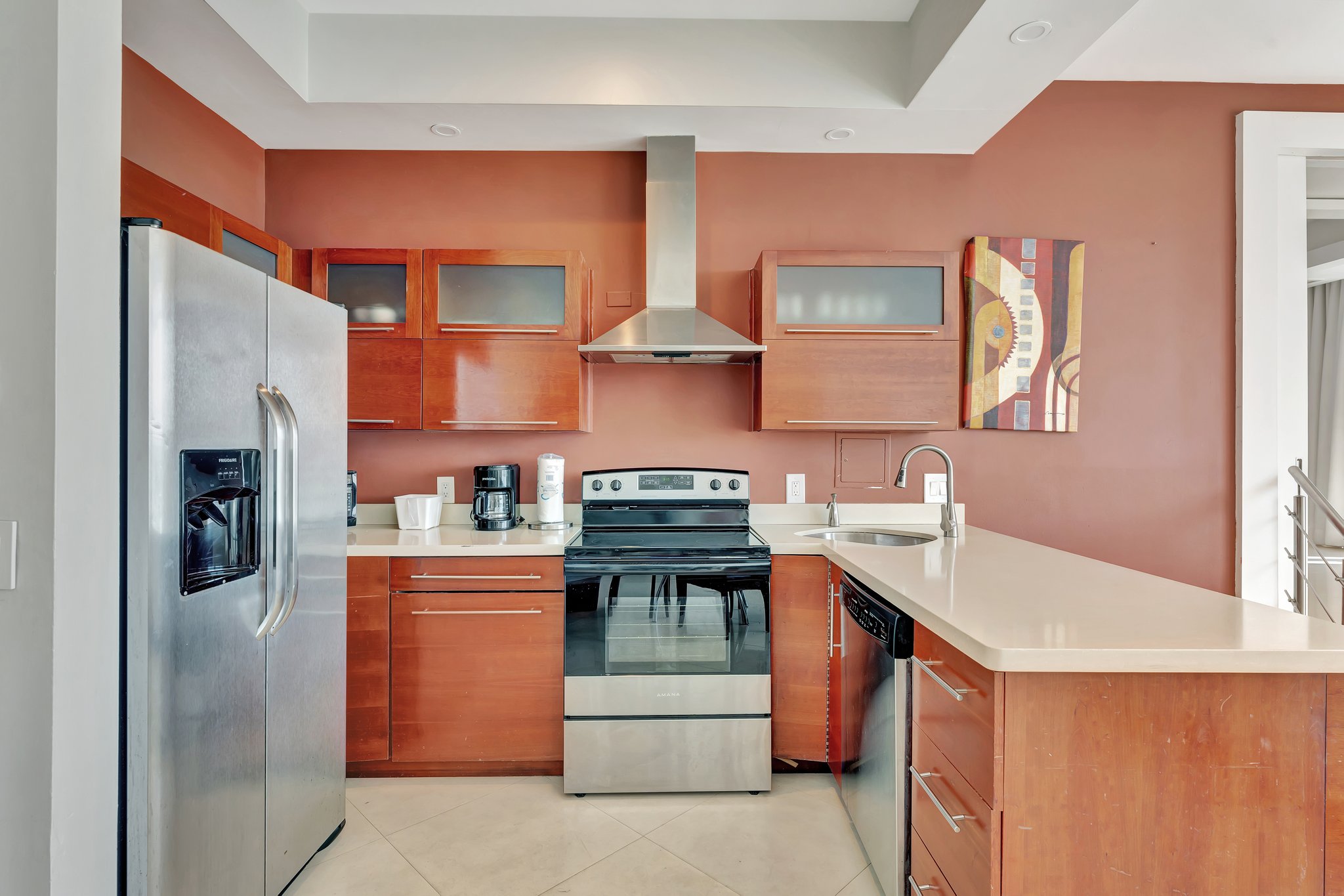 Alternate kitchen angle in 1005 Penthouse with modern cabinetry