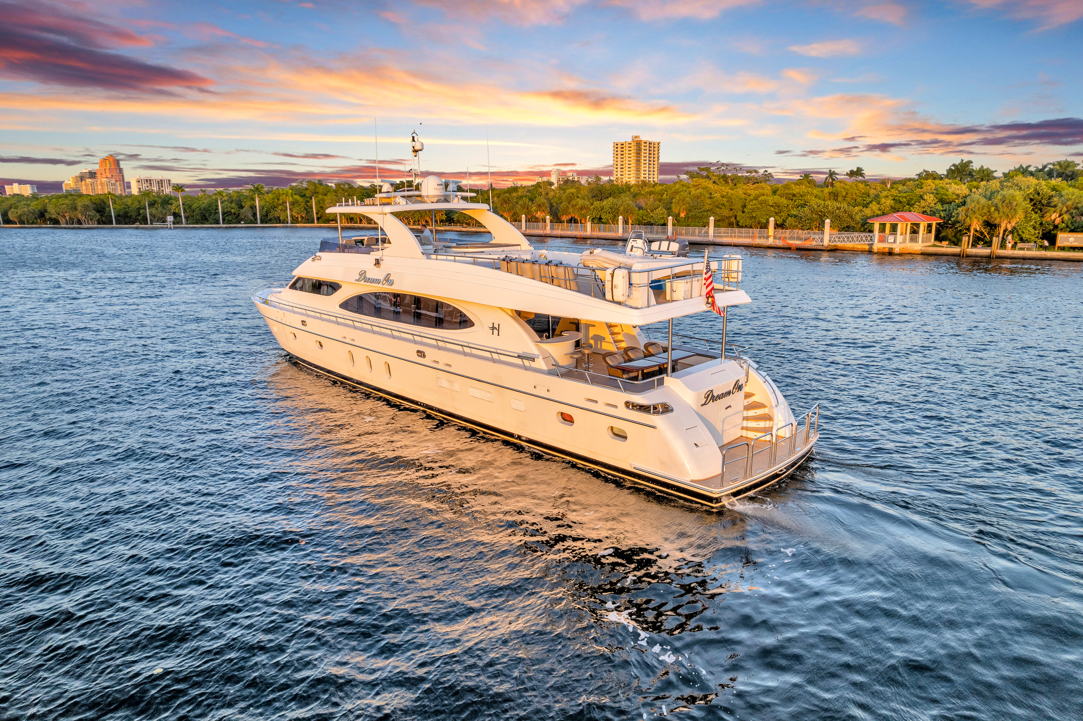 Starboard side view of the Dream On yacht docked in the marina
