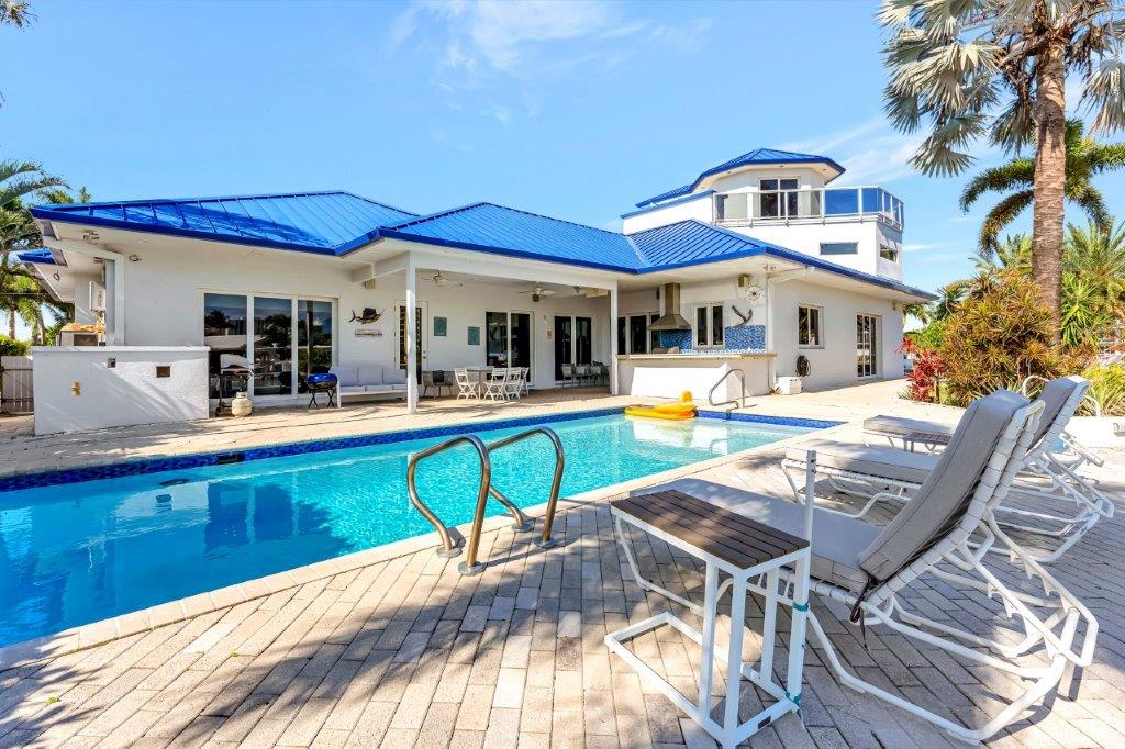 Luxury waterfront mansion at 2870 NE 9th Street Pompano Beach with private pool and modern exterior design