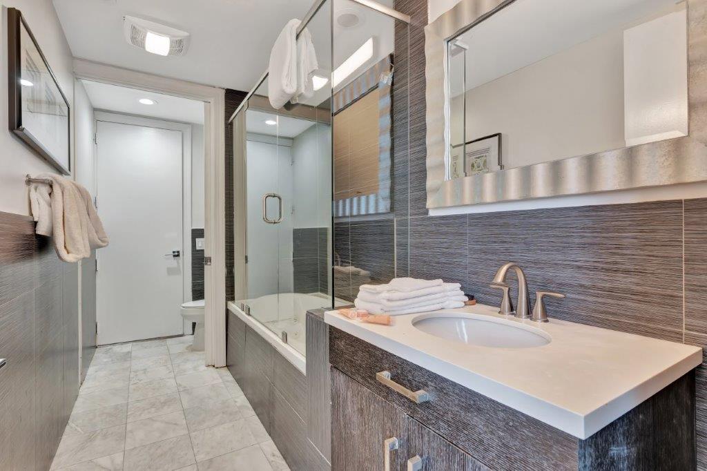 Luxury bathroom with glass shower and elegant vanity