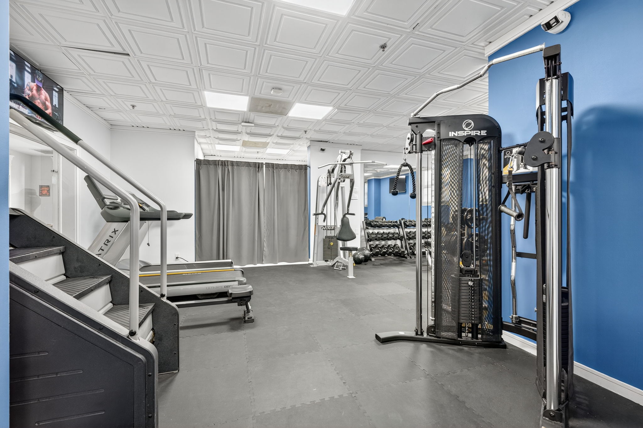 Cardio treadmills and multi-station machine at Ocean Manor hotel gym