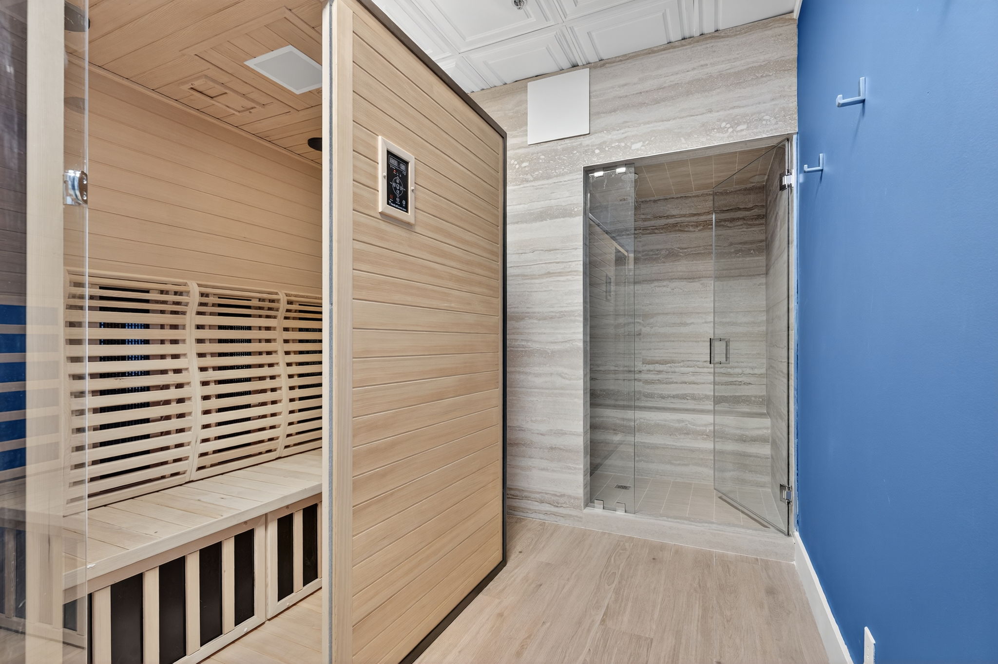 Infrared sauna cabin and marble steam room at OM Steam Wellness in Ocean Manor Resort