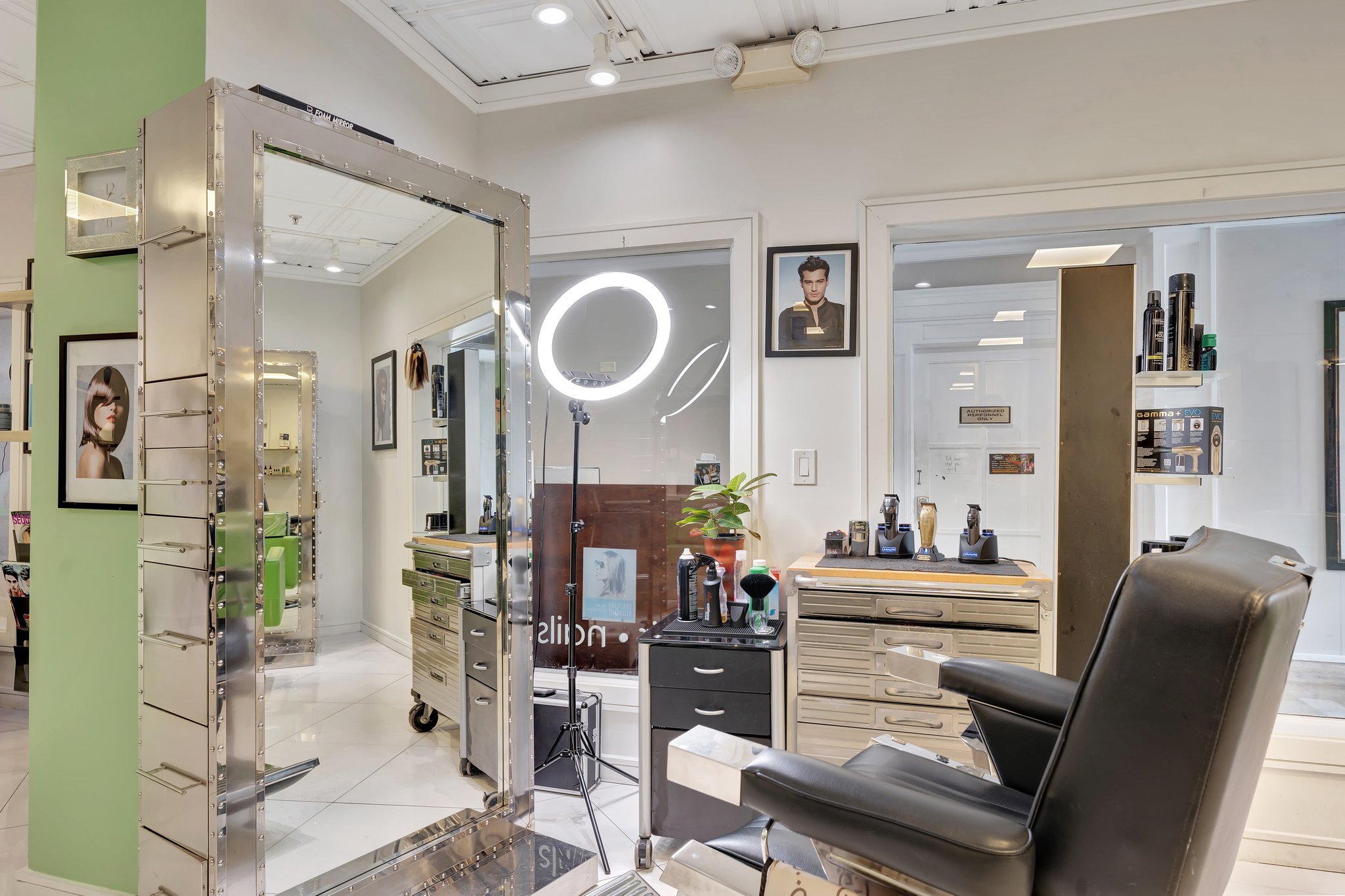 OMm Salon & Spa interior with stations for hair, nails, and spa treatments