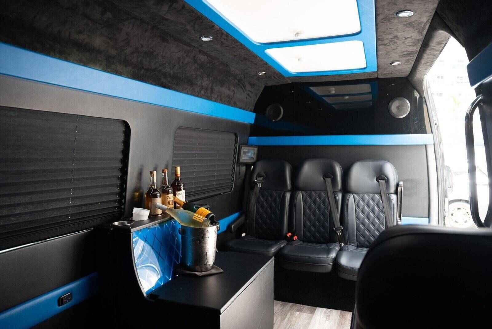Luxury leather seating and spacious cabin inside the Mercedes‑Benz Sprinter 3500 at Ocean Manor