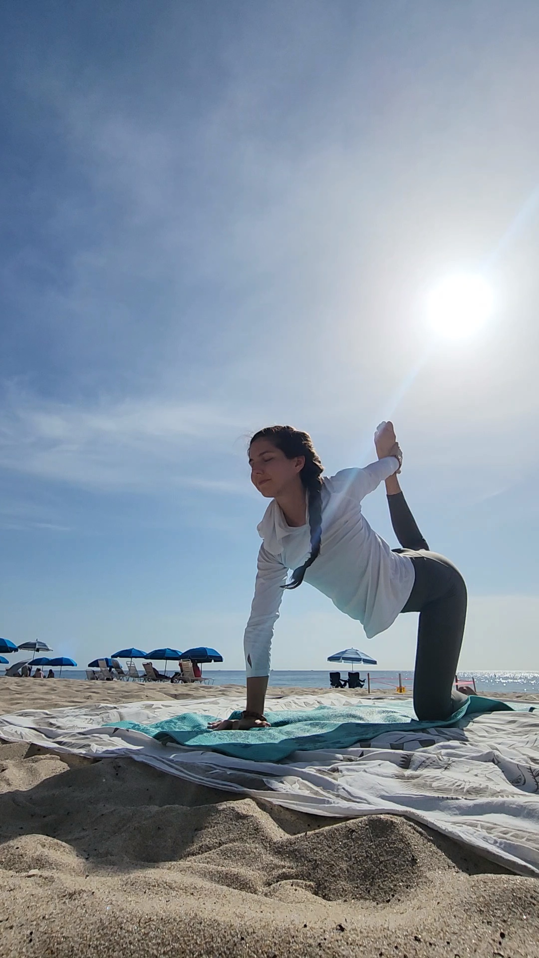 Sunrise beach yoga pose at Ocean Manor
